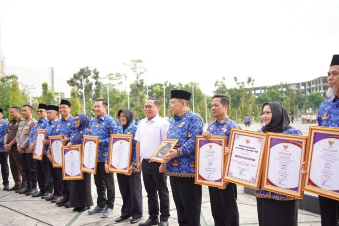 11penghargaan-uhc-2025-pemprov-riau